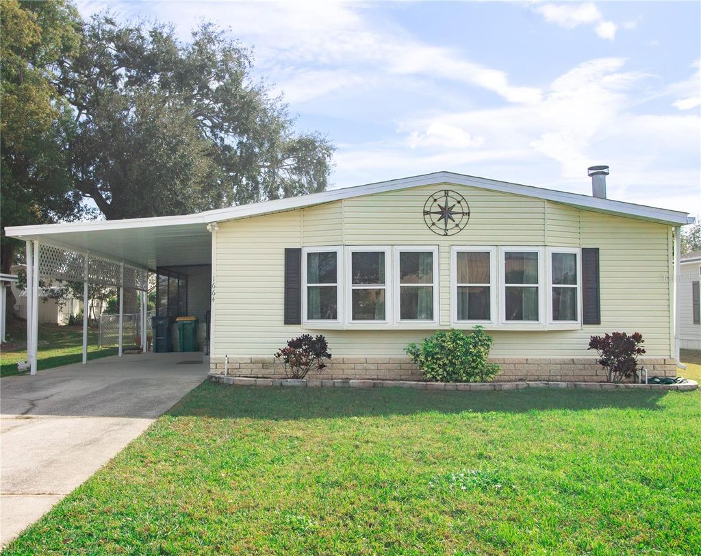 Photo of 1664 Elkhart Circle, Tavares, FL 32778 (MLS # G5106111)