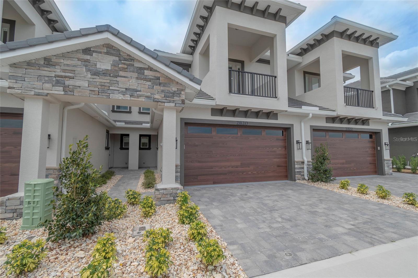 One or more photo(s) has been virtually staged. Like brand new. 3 bedroom 2.5 bath luxury townhouse facing hole #5 at the front door and hole #2 at the back door. 200 feet to pool and club house. Beautiful, gated community by Platinum Builders in Venetian Bay.Exquisite workmanship. Slate tile roof., Porcelain tile floors. upgraded premium counters and backsplashes. Tall ceilings.Detailed wood trim cabinets. Plantation shutters.Paver driveway. Covered back patio.2 balconies, one offer the primary bedroom. Upstairs den/office.10.3 miles to the beach. 3 miles to Walmart and I-95. 40 minutes to Orlando area. Primary bath has a bidet. This is luxury living with the ease of golf right at your front door. 9.4 ceilings upstairs and down