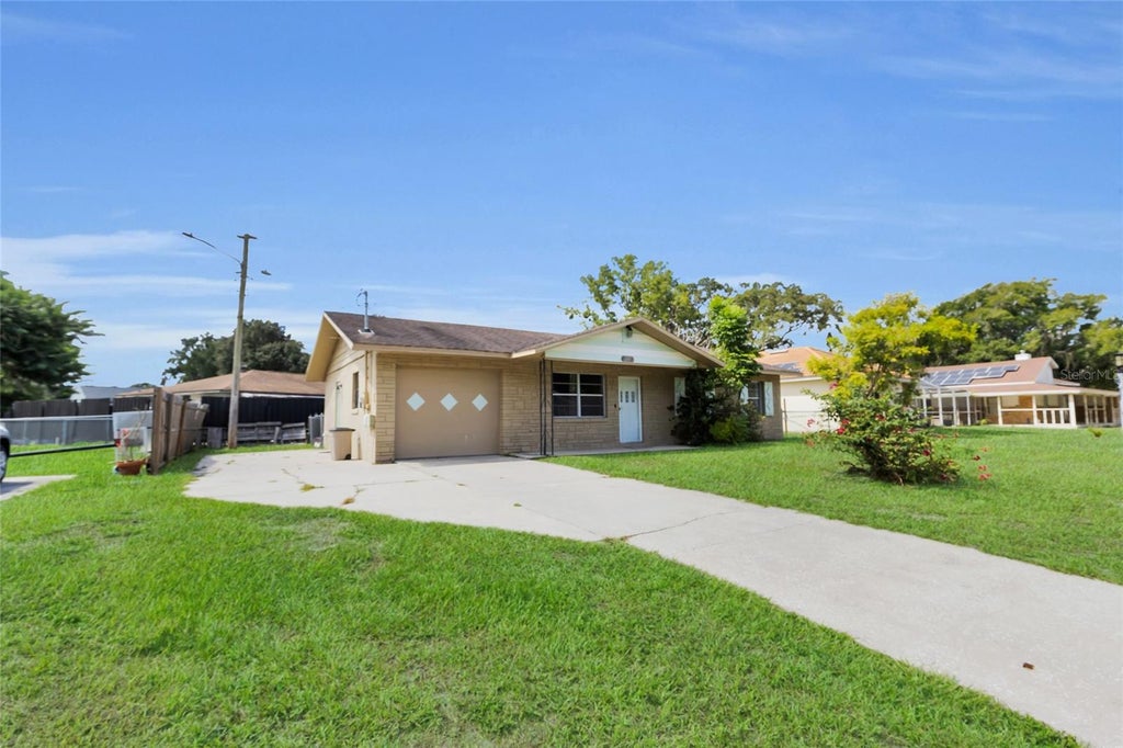 Photo of 207 Elaine Drive, Auburndale, FL 33823 (MLS # O6439819)