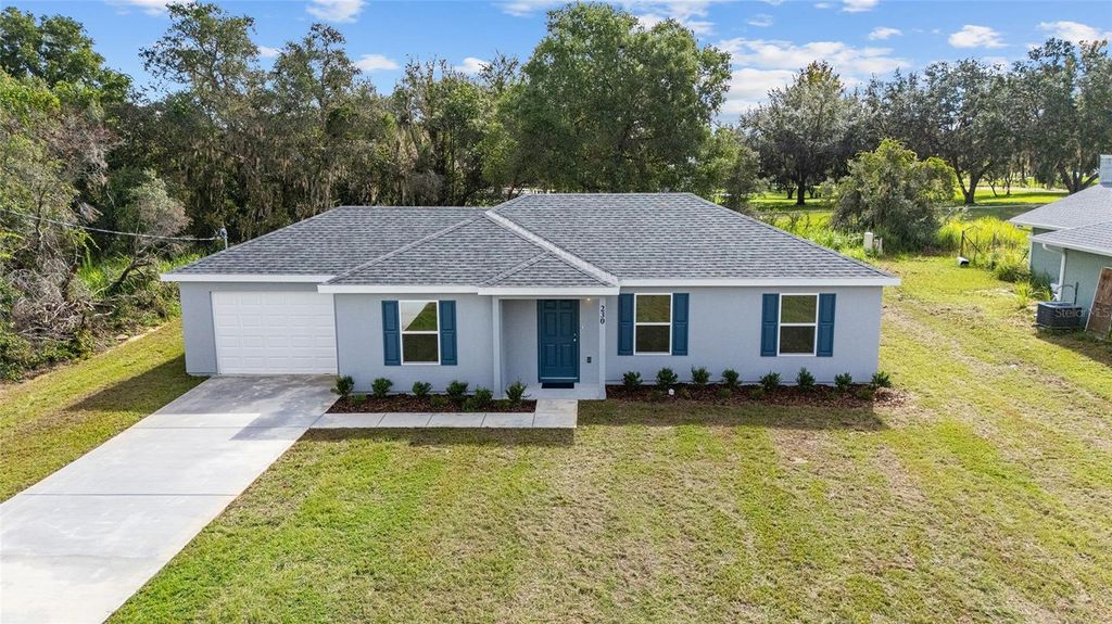 Photo of 234 Oak Lane Circle, Ocala, FL 34472 (MLS # OM712857)