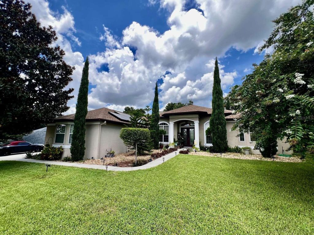 Photo of 16325 Magnolia Bluff Drive, Montverde, FL 34756 (MLS # TB8495073)