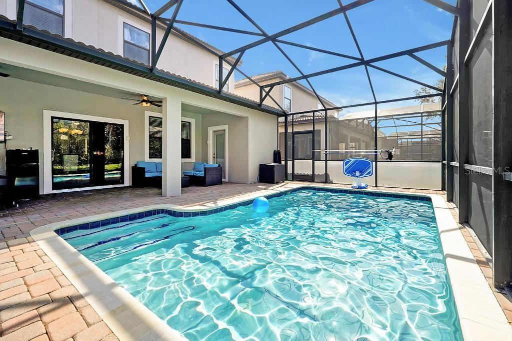 Photo of 1452 Myrtlewood Street, Davenport, FL 33896 (MLS # O6447828)