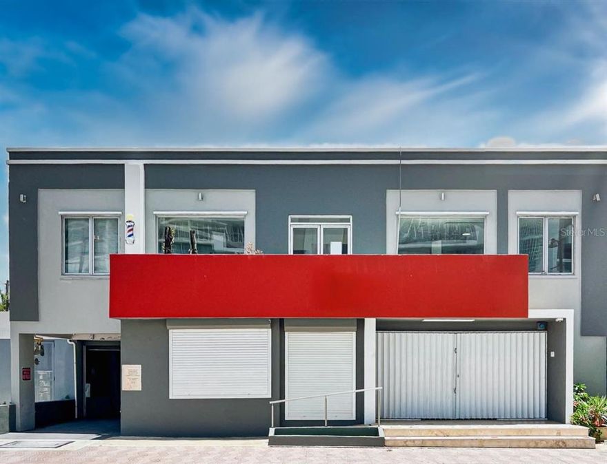 A mixed-use commercial-residential property located at Isla Verde Avenue, Carolina, Puerto Rico. The property consists of a site having 870.00 square meters, improved with two detached structures, having a total and combined gross building area of 5,541 square feet, with similar rentable areas. The structures are supported by 14 parking spaces and consist of a two-story single-tenant commercial building, plus a one-story detached single-family residential building. Additional improvements and amenities of the commercial building include a 80 square feet entrance porch, 129 square feet second floor frontal balcony, 174 square feet second floor rear balcony, rear stairs and elevator, surveillance cameras, concrete paved areas, ramps, perimeter fences (at the rear) and iron works. Other improvements of the residential unit consist of 305 square feet detached concrete storage and 35 square feet entrance porch. Both properties are connected to a 60 KW electricity generator and two water cisterns.  The property has potential  for the followings uses:  Commercial such Doctor Offices, Restaurants, Bread and Breakfast, Airbnb, Coffee Shops, Commercial offices.