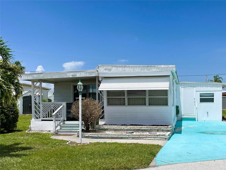 Located on a desirable lot and a half, this 2 bedroom, 2 bath home offers extra outdoor space and room to spread out—something rarely found in Trailer Estates. A welcoming front porch opens into a spacious living room that flows into the dining area and kitchen, creating a comfortable and connected main living space.  The roof and a c are just a few years old giving confidence at an incredible price point!

The primary bedroom features dual closets and direct access to an ensuite bathroom that conveniently doubles as the laundry room. The second bedroom includes a walk-in closet for generous storage. With an inside utility room, this home offers functionality and convenience along with its unbeatable location.

Located in Trailer Estates, a Special Park and Recreation District governed under Chapter 418, Florida Statutes, residents own their land—no lot rent, CDD, or HOA fees. The annual park tax covers cable, high-speed internet, trash pickup, fire and rescue services, and access to outstanding amenities including a marina with rentable boat slips, private beach, pool, hot tub, fitness center, shuffleboard, bocce ball, pickleball, woodshop, and nearly 60 active clubs and social events. Experience one of Sarasota Bay’s most vibrant and welcoming 55+ communities.