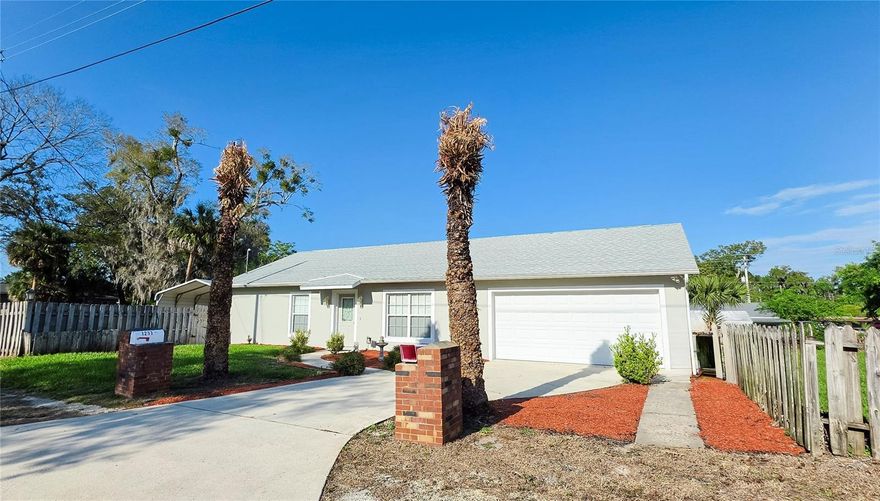 Welcome to 1277 Granada Ave — a rare opportunity to own a spacious home on a huge double corner lot totaling 0.37 acres with exceptional flexibility and outdoor potential. This property features a large backyard, a beautiful side yard, and even the possibility to split into two separate lots, making it attractive for both homeowners and investors.

Built in 2005 with solid concrete block construction, this well-maintained home offers 2 bedrooms and 2 bathrooms with a bright, open layout and high vaulted ceilings in the main living area. The home is truly move-in ready, featuring laminate flooring in the main areas and tile in the bathrooms, along with double-pane windows for energy efficiency.

The kitchen and living spaces flow seamlessly, creating a comfortable environment for everyday living and entertaining. Both bedrooms include walk-in closets, and the laundry room is thoughtfully designed with a sink and additional storage closet.

Step outside to enjoy a covered back porch, perfect for relaxing or hosting gatherings. The property also includes a workshop building, a storage shed, and dedicated boat storage with a separate gate, offering plenty of room for all your toys, tools, and hobbies.

Additional highlights include a 2-car garage, spacious parking options, and major systems update such as roof - 2025, AC - 2024, and water heater - 2019.

Location is a major bonus — you’re just 7 minutes from the Halifax River and only 20 minutes to the beach, giving you the best of Florida living.

This is a unique property with land, flexibility, and functionality — don’t miss it.