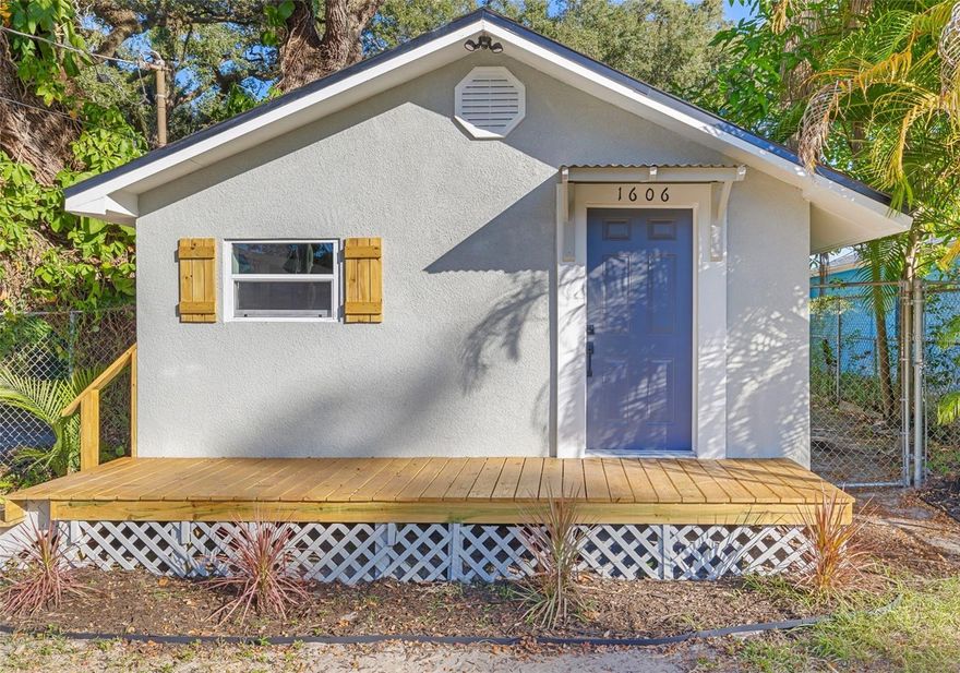 Welcome home to this beautifully renovated 2-bedroom, 1-bath retreat that perfectly blends style, comfort, and convenience. Step inside to a warm, inviting living room—ideal for cozy evenings in or effortless entertaining. The stunning kitchen shines with stainless steel appliances and thoughtful updates, making it a true centerpiece for everyday living and culinary creativity.  The spacious primary bathroom features elegant double vanities and a relaxing tub-and-shower combination, while the second bedroom offers flexibility to suit your lifestyle—whether as a guest room, home office, or creative space. Outdoors, enjoy a generously sized backyard ready for gatherings, gardening, or simply unwinding.  Ideally located, this home is just 10 minutes from vibrant Ybor City, 12 minutes from downtown Tampa, and offers quick access to I-275. This is comfort, style, and location coming together seamlessly—welcome to a home you’ll love living in.