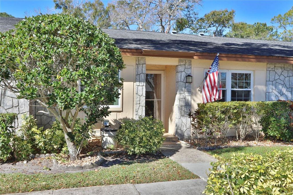 Photo of 880 Maclaren Drive N #B, Palm Harbor, FL 34684 (MLS # TB8468912)