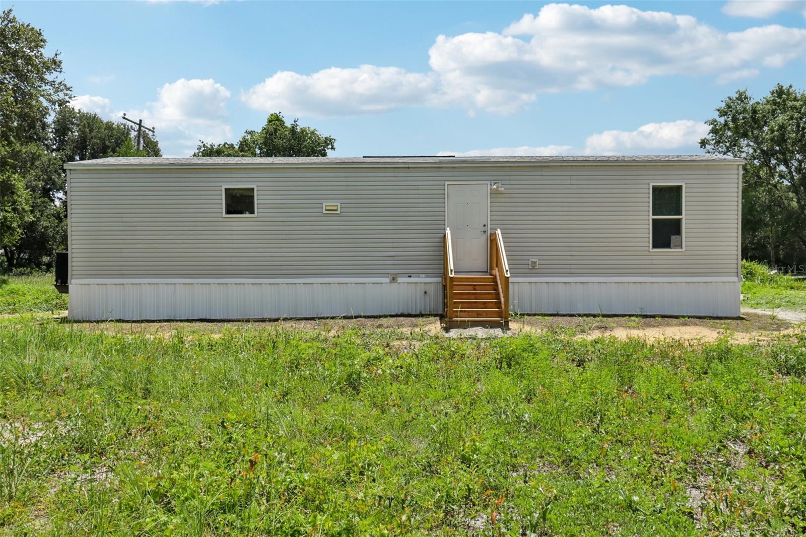 This is the opportunity you’ve been waiting for! Sitting on nearly half an acre with no HOA, this 2022 built mobile home offers incredible value and flexibility. With two spacious bedrooms, one full bath, and modern finishes throughout, it’s perfect for owner-occupants or savvy investors. The generous lot provides plenty of space for privacy, storage, or future possibilities. With strong rental potential and a high cap rate, this is a smart addition to any portfolio. Homes like this that are affordable, move-in ready, and with land don’t come around often. Schedule your private showing today before it’s gone!