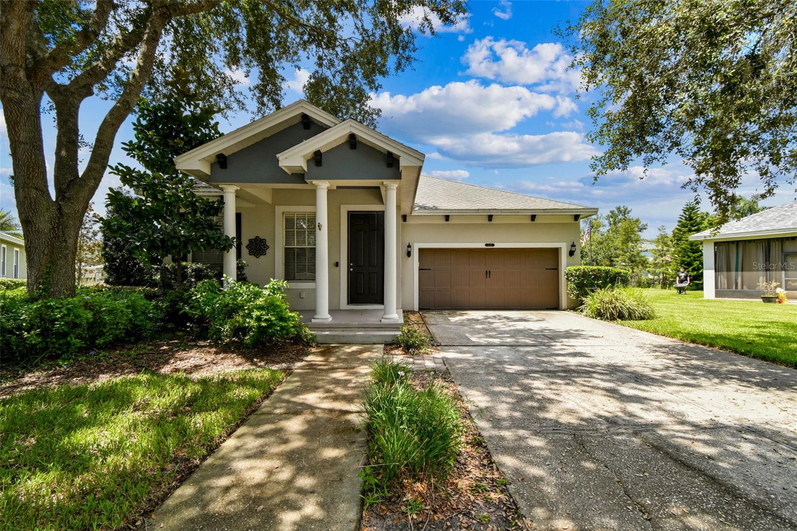 Welcome to Connerton! Tucked away on a quiet cul-de-sac, this stunning home sits on a quarter-acre lot overlooking a serene pond. Offering just over 2,400 sq. ft. of living space, it features 4 bedrooms, 3 baths, a 2-car garage, a covered lanai, an outdoor kitchen, a paver patio with a pergola, and a cozy fire pit.
Step inside to discover soaring ceilings, abundant natural light, and engineered hardwood floors throughout the main living areas. At the heart of the home, the beautifully updated kitchen boasts an abundance of cabinetry, sleek quartz countertops, GE Profile appliances, a built-in Oven and Microwave, Gas Cooktop, a French-style Refrigerator, a prep island, a walk-in pantry, and a casual dining nook. The eat-at bar overlooks the spacious family room, making it the perfect setting for gatherings and entertaining. Off the Kitchen is a large Laundry Room equipped with full size washer and dryer and more storage cabinets.
Step outside and experience true Florida living! The covered lanai and fully equipped outdoor kitchen extend your living space, while the extended paver patio with pergola offers a relaxing spot to unwind. Enjoy breathtaking sunsets over the pond or roast marshmallows by the built-in fire pit during cooler evenings.
The triple-split floor plan ensures privacy for everyone. The oversized primary suite at the rear of the home offers tranquil pond views and an updated en suite featuring a large walk-in shower with dual shower heads, bench seating, dual vanities, quartz counters, decorative shiplap wall, a water closet, and a linen closet with a makeup desk. The expansive walk-in closet is customized with a built-in organization system. Two additional bedrooms share a full bath off the hallway, while the fourth bedroom and third bath are tucked away for an ideal guest suite or in-law arrangement.
Living in Connerton means more than just a beautiful home—it’s a lifestyle! Enjoy access to miles of nature trails, a clubhouse with resort-style amenities including a cafe, community pool w Splash Bucket and slides, lap pool, fitness center, tennis and basketball courts, and more. The trail entrance is just a short walk from your front door, and the clubhouse is a quick bike ride away. Lawn care is included in the rent!