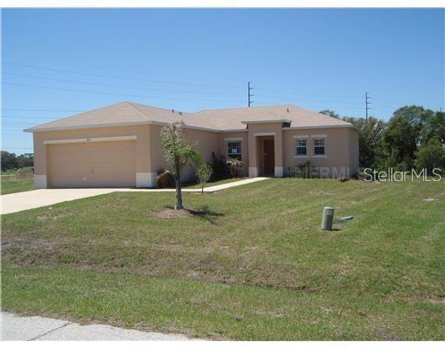 3 bedroom, 2 bath open floor plan with fresh paint and new luxury vinyl flooring.  Double car garage and separate laundry room.  Perfect home for Family living and entertaining.  Kitchen with breakfast bar and room for dinette set.  Sliding glass doors open to large rear yard with no rear neighbors.  Conveniently located near schools, shopping and community park.  Move in ready.
