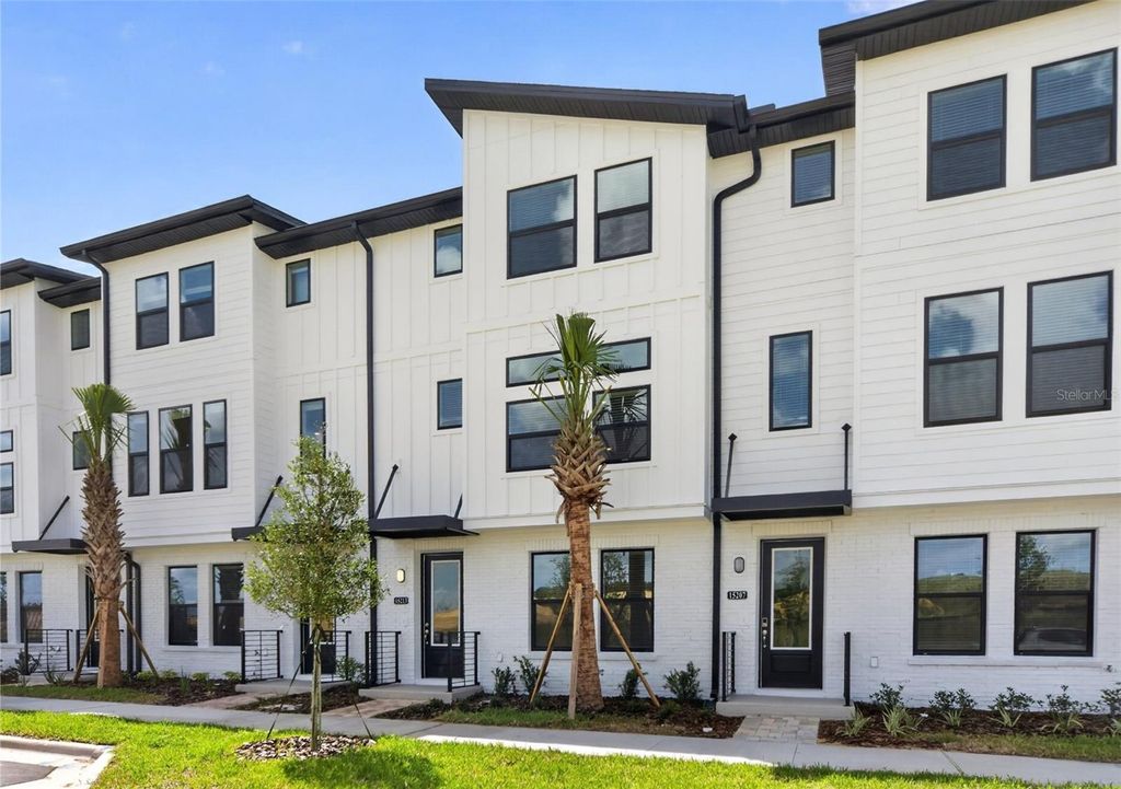 Photo of 15213 Hamlin Park Drive, Winter Garden, FL 34787 (MLS # TB8512228)