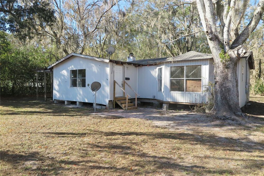 Photo of 8760 County Road 127, Sanderson, FL 32087 (MLS # GC538832)