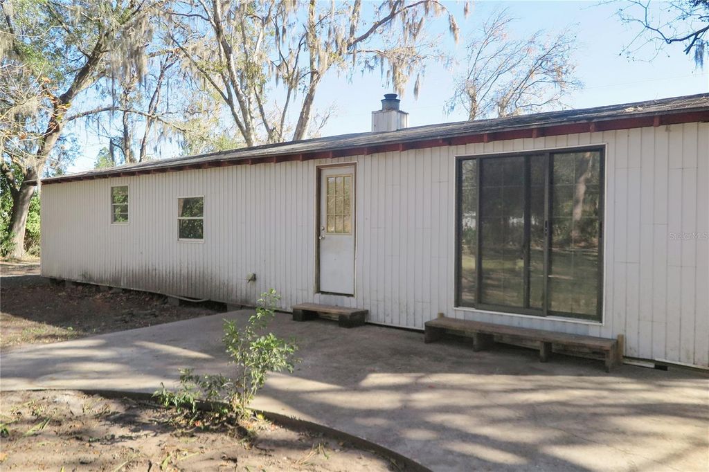 Photo of 8760 County Road 127, Sanderson, FL 32087 (MLS # GC538832)