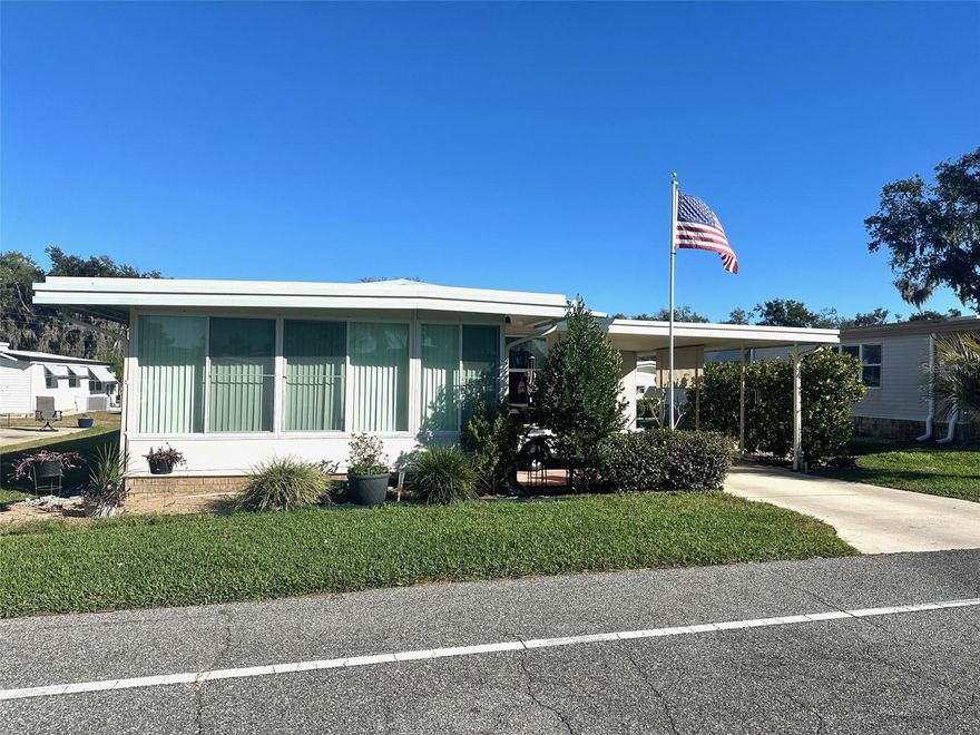 Tired of the cold weather and snow?? NOW is the time to move! Welcome to easy, carefree, sunshine living in this well-maintained 2 bedroom, 2 bath mobile home located in a desirable 55+ gated community packed with amenities. This home has seen several recent updates, including new double-pane insulated windows, a recently seal-coated roof, and new vinyl plank flooring throughout most of the home, giving it a fresh, modern feel.

The oversized main suite offers a comfortable retreat with a private en suite featuring a step-in tiled shower. A spacious Florida Room adds extra living space—perfect for relaxing, entertaining, or enjoying your morning coffee.

For added peace of mind, the home is equipped with two medical alert buttons monitored 24 hours a day, by the community’s private emergency service with dedicated EMTs. This is a service included in the HOA fees. The community truly stands out with its impressive amenities.

With so many activities, clubs, and events, there’s always something to do—you’ll never be bored here! This is a wonderful opportunity to enjoy comfort, security, and an active lifestyle all in one place.