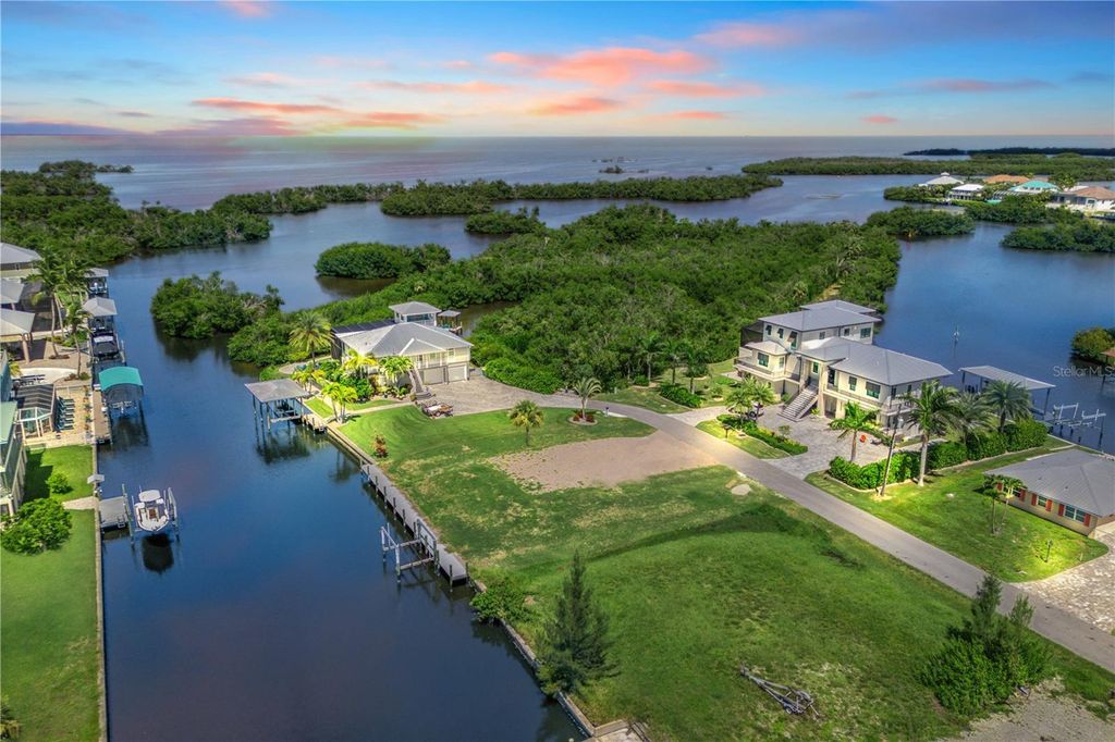 Photo of 24159 Blackbeard Boulevard, Punta Gorda, FL 33955 (MLS # A4661497)
