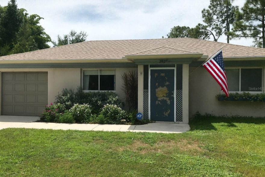 More photos coming!!!  2 bed / 2 bath home with a bright, open feel! Large back fenced yard. Garage has been converted to 1/2 garage and 1/2 living AC area which could easily be a 3rd bedroom (would need to add closet), or an office.  On top of this bonus ac'd area there is a family/florida room off the kitchen dining area.  This home has a roomy layout with tall ceilings and tile floors in the main areas. The bedrooms and the Florida room have easy-care wood-look floors.

The kitchen has a warm, fresh look with granite tops, a big island, soft-close doors, shiny steel appliances, and a deep farm sink. The living room flows right into the kitchen, so it feels open and great for daily life.

The main bed has wood-look floors, built-in closet space, and a private bath with a walk-in tile shower and a newer vanity. The guest bed sits near the guest bath, which has a clean shower/tub combo.

The inside laundry room offers plenty of space and a pantry area. Off this area is a bonus room that was part of the old garage — great for a small den, craft room, or office.

The Florida room leads out to a fenced yard with nice shade spots, a pergola, and a paver area for cookouts or just to sit and relax.

NOTE: Washer/Dryer and black fence in front side do not convey.