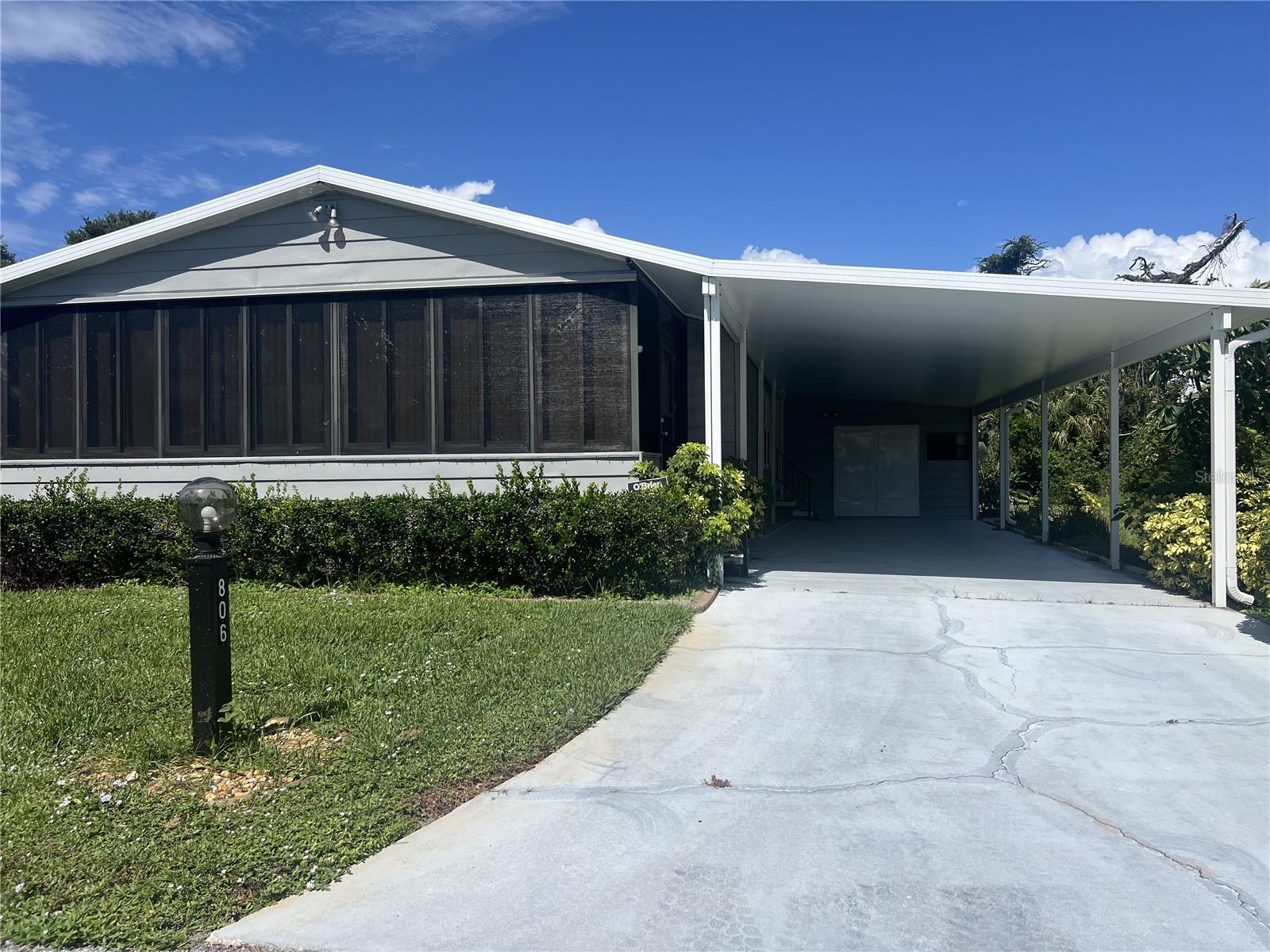 2 Bedroom 2 bath with 2 car carport in Tangerine Woods.
