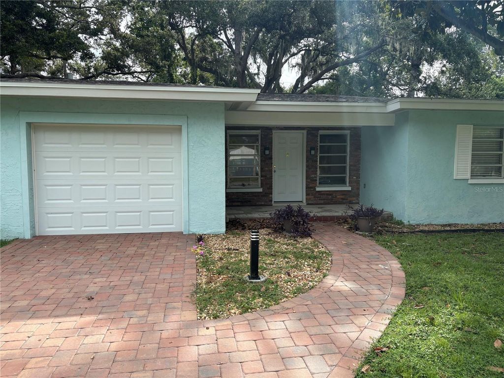 Photo of 1669 Paloma Lane, Dunedin, FL 34698 (MLS # TB8416669)