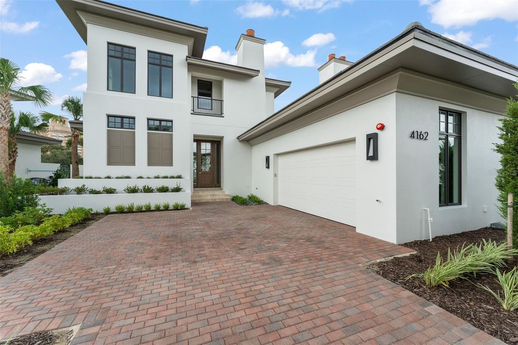 Photo of 4162 Grande Brick Loop #27, Orlando, FL 32837 (MLS # O6352921)