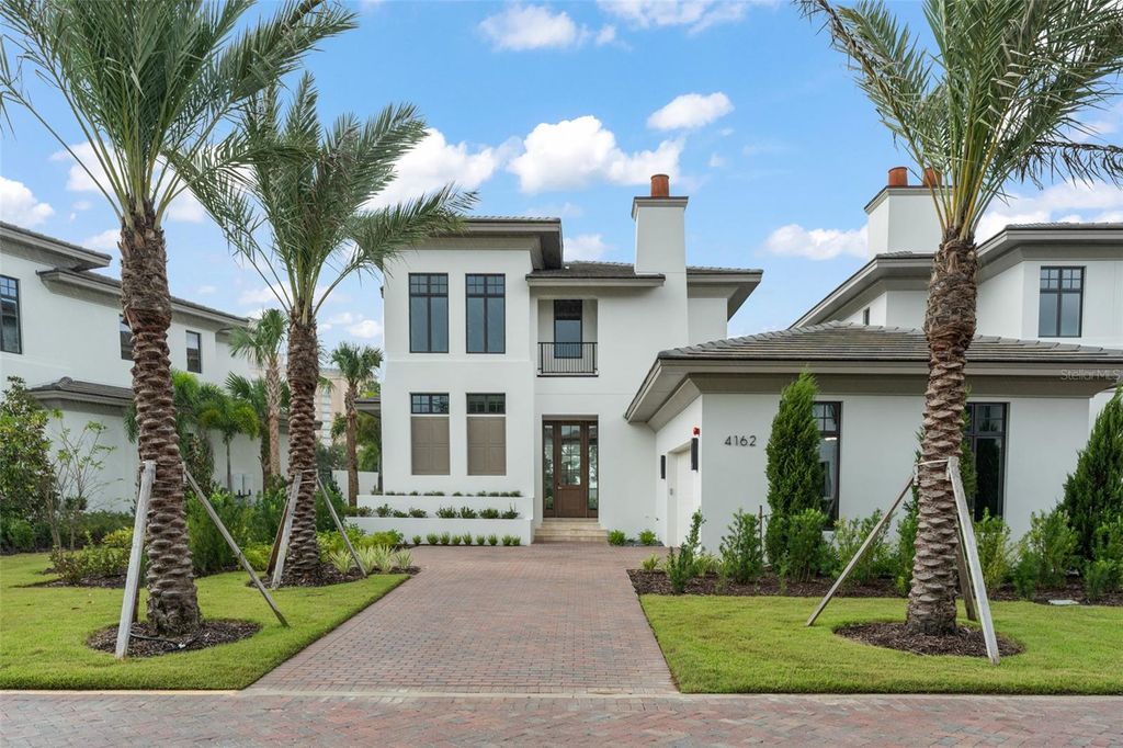 Photo of 4162 Grande Brick Loop #27, Orlando, FL 32837 (MLS # O6352921)