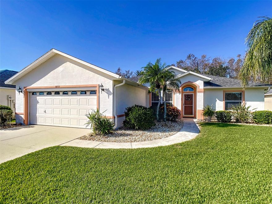 Move right into this beautiful home situated on a very private lot. The moment you enter, you’ll be drawn to the magnificent open floor plan.  The great room flows to a spacious sunroom – open the windows to let the breeze in or if you need a little heat, it has a separate heating/air conditioning unit.  Step out onto the attached screened porch which overlooks the lushly landscaped private backyard leading to a conservation area.  The Kitchen boasts sun tunnel, cabinets with convenient pull-out features, stainless appliances, casual eating area and a formal dining room is just steps away.  The owner’s suite is situated for privacy, and the bath boasts a raised vanity with double sinks, large walk-in shower, separate water closet and spacious walk-in closet.  Two additional roomy bedrooms share a bath.  There is even a motorized screen on the garage door, keeping unwanted elements like bugs out while letting desirable elements such as fresh air and a cool breeze in and your neighbors won’t be able to see inside.  A storage shed built in the backyard is an added benefit, great for the gardener of the home. ;Water: City