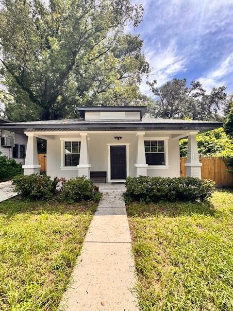 Welcome to this Charming Tampa Bungalow!
This beautifully updated 3-bedroom, 2-bathroom home offers the perfect blend of classic Florida charm and modern convenience. Nestled on a quiet street in the heart of Tampa, the property is ideally located near I-275, downtown Tampa, Seminole Heights, and all the area’s top attractions. Upon arrival, you’ll notice the fresh exterior paint, new fencing, and welcoming curb appeal. Inside, the updated kitchen features sleek countertops, ample cabinetry, a convenient breakfast bar with pendant lighting, and a cozy dinette area. The primary suite includes a private en-suite bathroom, while two additional bedrooms provide plenty of flexibility for guests or family. A bright 11x9 sunroom overlooking the backyard adds bonus space that is perfect for reading, a playroom, or even an indoor garden. The spacious, fully fenced backyard with mature trees is ideal for pets, weekend BBQs, and relaxing outdoors, and the newer shed offers additional storage. Other highlights include a washer and dryer. Located less than a block from the Hillsborough River and Mann-Wagnon Memorial Park, this home provides both convenience and comfort. Lease terms are flexible, available month-to-month or up to eight months maximum.
