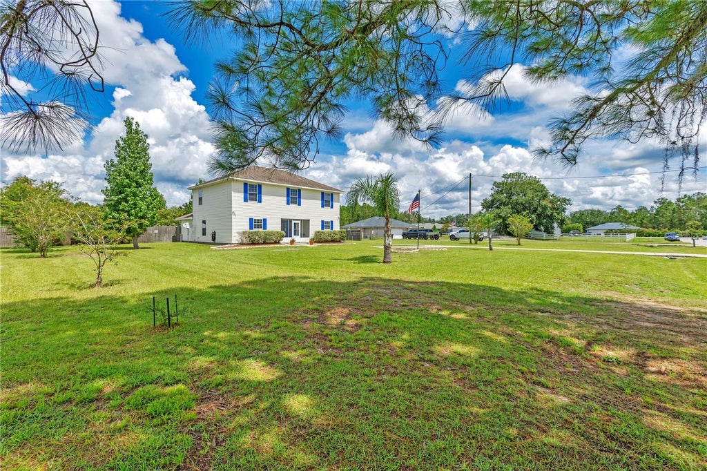 Photo of 7228 Evergreen Loop, Polk City, FL 33868 (MLS # O6439108)