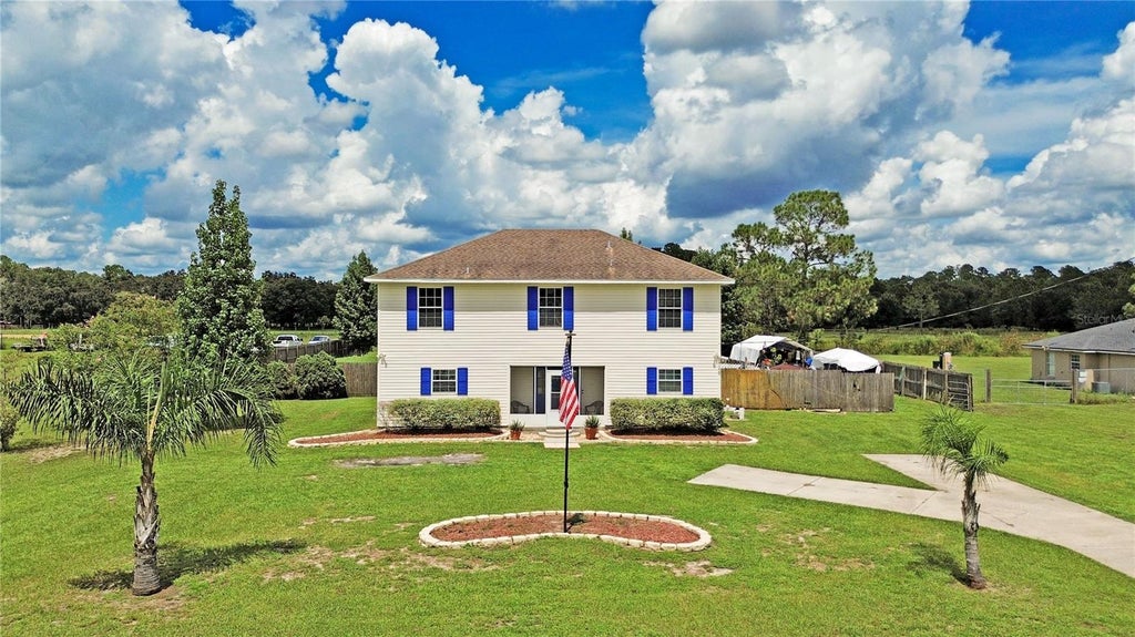 Photo of 7228 Evergreen Loop, Polk City, FL 33868 (MLS # O6439108)