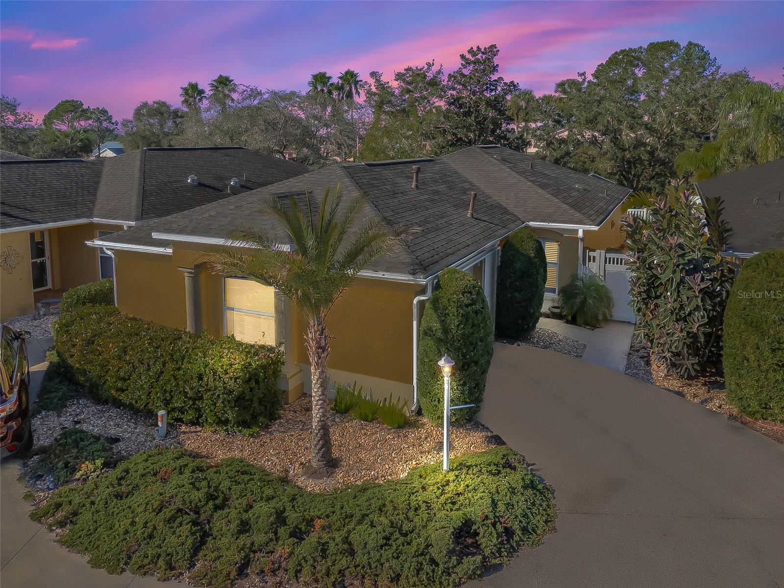 One or more photo(s) has been virtually staged. BOND PAID! Charming 2-bedroom, 2-bath - Richmond Courtyard Villa located in Villa Berea, in the Village of Polo Ridge. The home features an eat-in kitchen with oak cabinets, pull-out drawers, a stainless steel gas range, stainless steel refrigerator, generous counter space, ample storage, and a closet pantry. A convenient pass-through connects the kitchen to the dining room, which offers sliding glass doors leading to the side courtyard—ideal for grilling or enjoying outdoor dining. The living room opens to a glass-enclosed Florida room with vaulted ceilings and a beautiful view of the Glenview Championship Golf Course fairway. The guest bedroom includes its own bath with a tub/shower combination. The spacious primary bedroom features a walk-in closet, private bath with shower and vanity, and sliding glass doors to the Florida room.
Additional updates include: roof (2021), HVAC (2024) with a transferable 10-year parts and labor warranty, ECOBEE Smart Thermostat, and a sub-panel for generator quick hookup. Fresh interior paint and newly landscaped front yard enhance the curb appeal. Conveniently located near the Polo Fields, dining, and recreation.