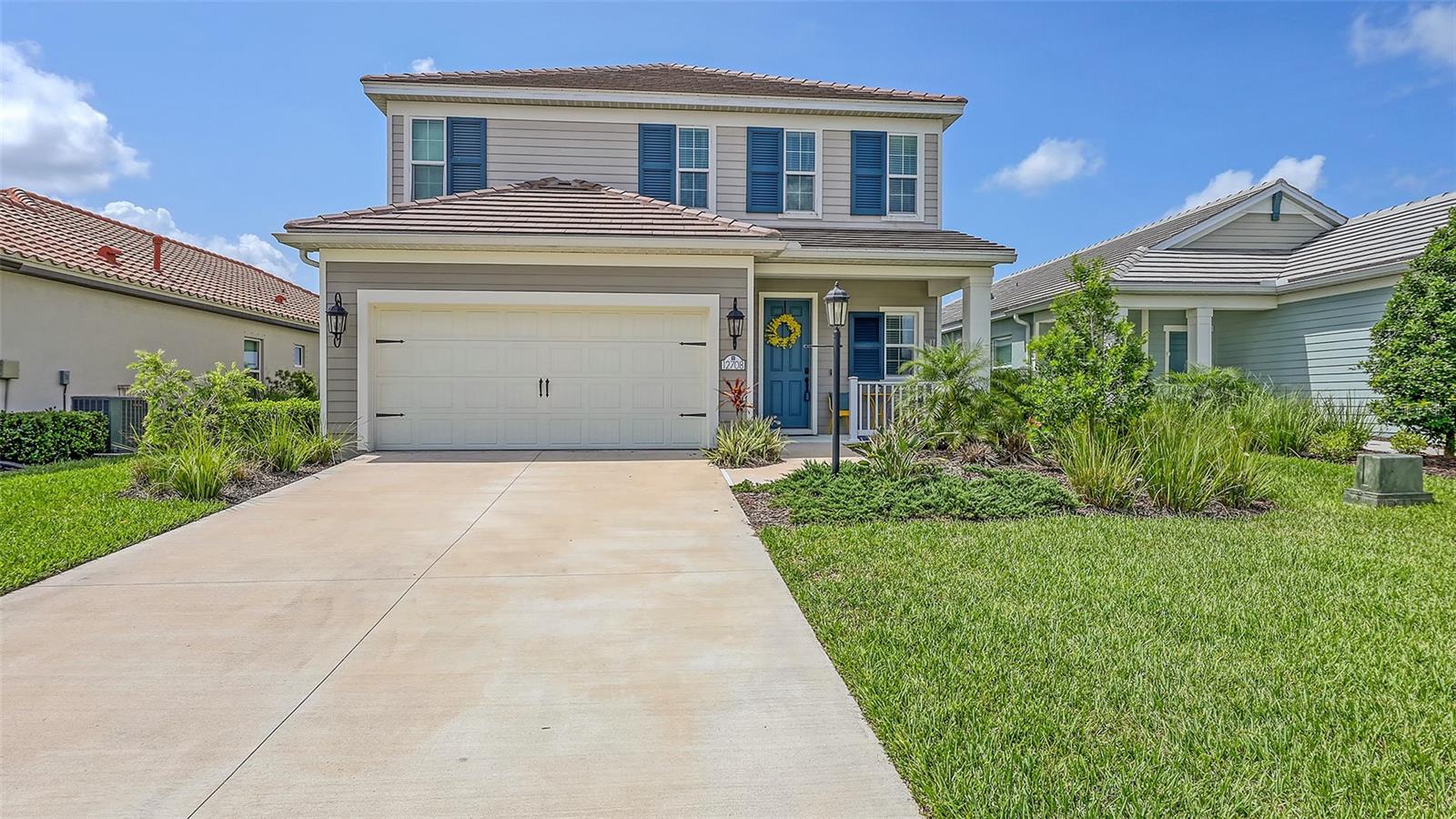 Spectacular Water Views from this 4 bedroom, 2 ½ bath with bonus area. Located in the gated and maintenance free community of Indigo, Lakewood Ranch. The Heritage floor plan has primary bedroom and bath room, power room, great room, kitchen, kitchen table area, 2 car garage and large lanai on first floor. Second floor has 3 additional bedrooms, bonus room and second bath room. Indigo is a gated community that features: 24/7 gym access, two resort style heated pools, 2 spas, four pickle ball courts, two bocce ball courts, playground, amenity center with banquet room, full time activities director with over 15 clubs to join, and full time on-sight HOA manager. WHOLE HOUSE IMPACT RESISTANT GLASS! Great room offers vinyl plank flooring, 4 recessed lights, 85” ceiling fan and Prewire for TV wall mount. Kitchen features include eating space, large island with sink, white cabinets with under LED lighting on uppers, stainless steel appliances, quartz counter tops, tile back splash, upgraded garage disposal and vinyl plank flooring. Upgraded fixtures throughout, 52” ceiling fans in all bedrooms and murphy bed can stay or go in upstairs bedroom. There is also a Smart garage door and 2 ceiling fans that run from app.