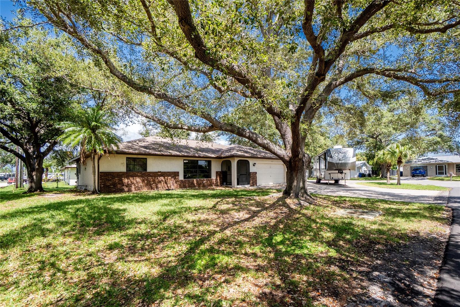 Beat The Heat, with this 3 Bedroom 2 Bath Pool home, located less than 3 miles to the Beach! This home sits on a corner lot with beautiful oak trees and a circular driveway. NO HOA so park your RV or boat on the designated parking pad with electric hook-up available. Enter this home to view a large Great Room with sight lines out to the patio. With an open and airy layout, the main spaces of this home flow well from one room to the next. The kitchen has a breakfast bar and prep counter overlooking the open dining space. The split floor plan gives all 3 Bedrooms the perfect amount of privacy. On the right side of the home is a spacious indoor Laundry Room and the Primary Bedroom. The Primary has a large Walk-In closet and en suite Bath that features a walk-in shower. Both Bathrooms were updated in 2024 with Paint and New Fixtures. The flooring in almost the whole home was also upgraded in 2024 to luxury vinyl plank. More Upgrades in 2024 include; HVAC and sliding glass door to the patio and pool deck. The fully screened Patio and Pool deck feature both covered and uncovered areas, perfect for entertaining and family cookouts! There is a separate open patio in the backyard available for a cozy night around a fire pit. Not only is this property less than 3 miles from Manasota Key Beach, but also located in an A+ Rated School District. Drive less than 5 miles and reach numerous restaurants and shopping, as well as world class golf courses. South Venice offers it's residents a Boat Launch and Private Beach Ferry for a small annual fee.
Don't miss out on the this wonderful home in a great location.