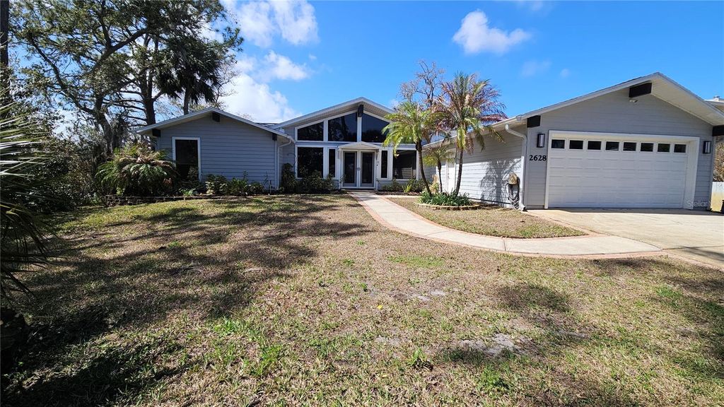 Photo of 2628 Sunset Drive, New Smyrna Beach, FL 32168 (MLS # V4947763)