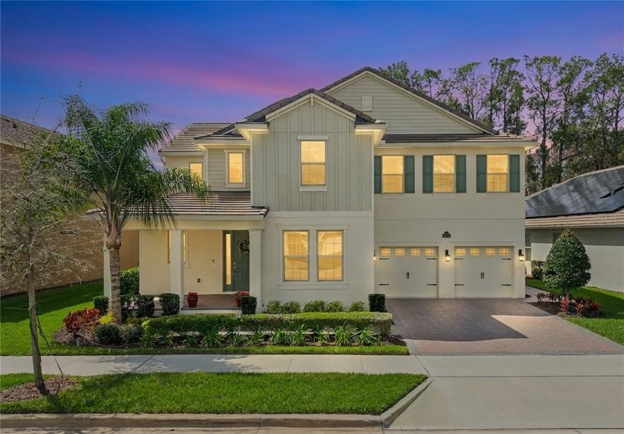 LUXURY POOL HOME on PREMIUM LAKE FRONT LOT!  Unique Opportunity to Enjoy an Outdoor PARADISE with STUNNING LAKE, CONSERVATION & SUNSET Views! The HOA is Allowing Docks on these Special Lots – Relax, Fish or Kayak!   Most POPULAR Floor Plan – North Haven – has 5 Bedrooms, 3.5 Baths, Gourmet Kitchen, First Floor Primary Suite, TONS OF STORAGE, Tile Roof and 3 Car Garage.  The OUTDOOR LIVING Space is SPECTACULAR - $200,000 to Duplicate!  Generous COVERED Patio PLUS additional Covered CABANA SPACE is 34 FEET LONG!  DELUXE Heated POOL and SPA with Upgraded Pavers, PANORAMIC SCREEN, Large SUN SHELF with Bubblers, PEBBLETEC Surface, Mosaic Accent Tile, SALT SYSTEM, LED Lights and FULLY AUTOMATED SYSTEM for Chemicals!  PLUS Ledge Loungers and Basketball Hoop are Included!  This MODEL PERFECT Home has a GOURMET KITCHEN with 42” Cabinets, Large Island with QUARTZ COUNTERS, Upgraded Subway Tile Backsplash, NEW PENDANT LIGHTS, Large SINGLE SINK, SS APPLIANCES including BUILT-IN OVEN and COOK TOP with VENT HOOD and FRENCH DOOR Refrigerator. !  Large Pantry and Butler Pantry add Storage!   OPEN FLOOR PLAN with Views of the Patio, Pool and LAKE from Family Room and Casual Dining!  First Floor Primary Suite with CUSTOM CLOSET has a Bath that Features DOUBLE Vanities, OVERSIZED SHOWER and Garden Tub.  FLEX Space can be Dining Room, Office or Living Room.   Convenient Powder Bath and FULLY Remodeled Laundry Room with Cabinetry, Utility Sink and RO Water System Complete the First Floor.  Entire First Floor has WOOD PLANK Porcelain Tile, 8’ Doors and 5 ¼ Molding.    Stairs are Engineered Wood with Wrought Iron Spindles.   The HUGE LOFT separates the Upstairs.  ALL 4 Bedrooms have WALK IN Closets – but Bedroom 3 has a CUSTOM CLOSET.   Bedrooms 2 and 3 share Full Bath 2 and Bedrooms 4 and 5 Share a Jack-and-Jill Bathroom.  These Owners Thought of Everything!   Paver Path to Store Trash Bins, Gutters with LEAF GUARD, Salt Free Water Filtration System, Custom Valances, Interior Painted with QUALITY paint, AC with Ultraviolet Sanitizing, Upgraded PRIVACY Landscaping, Garage with EPOXY FLOOR, Overhead Storage Racks and CUSTOM Storage System!   Waterleigh is the PREMIER LIFESTYLE COMMUNITY with 4 Resort Style Pools, 3 Clubhouses with Fitness Centers, Walking Trails, Sand Volleyball, Dog Park, Fishing and Observation Pier, Tennis, Pickleball, Playgrounds and more! HOA Does all Yard Maintenance.   All this zoned for NEW Atwater Bay Elementary, Water Spring Middle School and Horizon High School!  Close to Disney, Shopping, Dining, 429, I-4, 417 and a NEW PUBLIX!