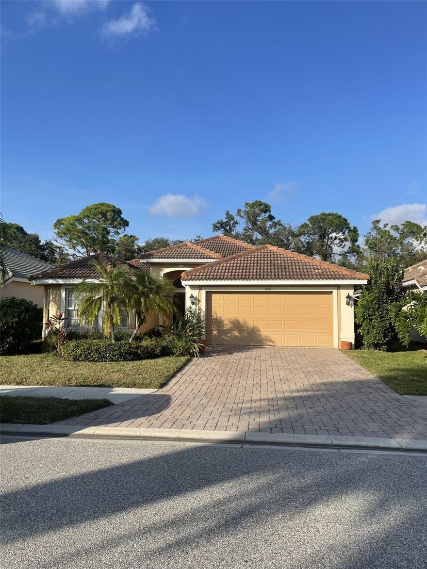 Comfortable and elegant home in desirable Stoneybrook with low HOA fees!  Brand new complete AC system installed, June 2024. Beautiful, upscale interior treatments and move in ready. Comfortable 3/2 or 2/2 with office. Room for a pool or dog fence. Backs to quiet preserve area with stream. Community pool, spa, fitness, tennis and clubhouse. Previously a model, this gorgeous home has numerous extra interior details to the ceilings and walls that make for an elegant yet comfortable home. TV room with extra large, wall mounted TV. Two car garage, alarm, open plan with eat in kitchen and dedicated dining room area.