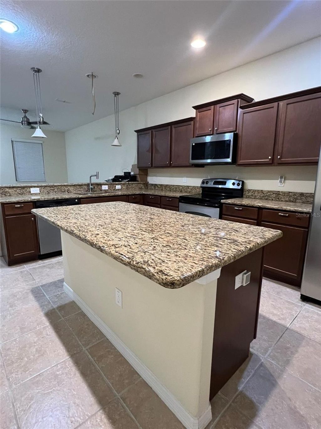 Photo of 9110 Savannah Grove Lane, Orlando, FL 32832 (MLS # O6382764)