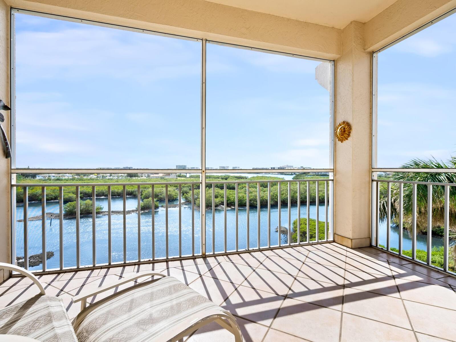 Views, views, views! It's all about the views. Relax and enjoy this luxurious waterfront penthouse offering breathtaking views that stretch from Phillippe Creek to the Intracoastal Waterway, Siesta Key and beyond. Natural light and soft tropical breezes flow seamlessly throughout this spacious three-bedroom end-unit condominium. The southwestern-facing, screened-in lanai affords shade throughout the day and is the perfect place to enjoy watching colorful sunsets. The main bedroom is generous in size, with direct access to the screened-in lanai. The two guest bedrooms are separated by a Jack-and-Jill bath. The kitchen easily accommodates a breakfast set and is outfitted with an island and plenty of cabinets with storage. Your assigned and secure parking space, along with a private storage unit, is conveniently located under the building. Bike racks, shopping carts and rolling racks are also available. This well-maintained residence is located behind the gates of The Landings, a residential community West-of-Trail, and an easy drive to world-famous Siesta Key Beach. A sampling of The Landings' amenities includes a junior-sized Olympic swimming pool, spa, Har-Tru tennis and pickleball courts, fitness center, workout room and active clubhouse. Additionally, residents of Eagles Point Circle have access to their own swimming pool and barbeque area.