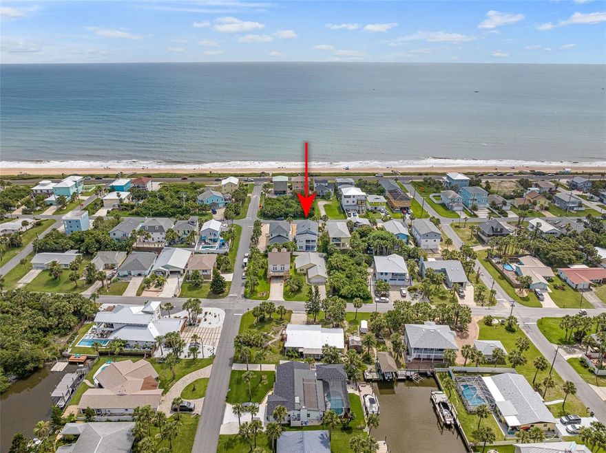 Introducing 1115 N. Central Ave. in Flagler Beach—a spacious coastal retreat just one block from the ocean, designed for relaxation, entertaining, and versatile living. With 2,675 square feet, this 3-bedroom, 3-bathroom home is ideal as a vacation getaway, second home, or investment opportunity. The main living area is filled with natural light from striking circular windows, creating a warm, inviting space for gatherings. From the front balcony, enjoy gentle ocean breezes, while the upstairs primary suite opens to a large covered balcony perfect for morning coffee or evening unwinding. An oversized loft upstairs provides endless options—whether you envision it as a media room, office, playroom, or even a fourth bedroom. Adding to its appeal, the home features a private in-law suite with a full kitchen, living room, and bedroom—an excellent setup for extended family or rental income. Recent upgrades include a brand-new roof, two new AC units, a new hot water heater, fresh interior and exterior paint, and updated light fixtures. Just minutes from Flagler Beach’s restaurants, shops, and parks, this home blends coastal charm with modern comfort and flexibility—move-in ready and waiting for new memories.