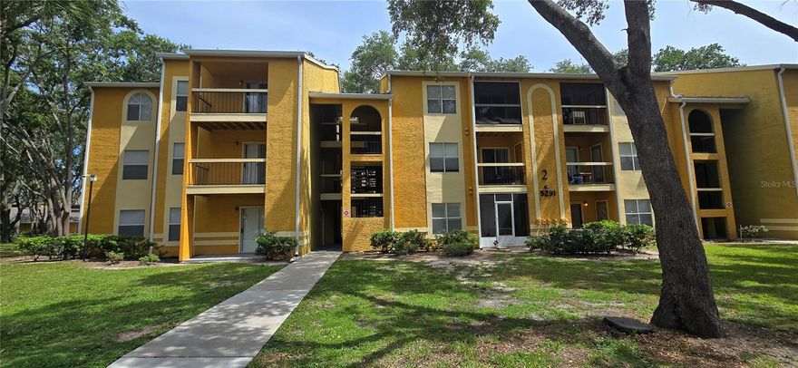 Prime Location – Just Minutes from Everything!

Welcome to this charming 2-bedroom, 1-bath condo located on the third floor in a highly desirable area—just 20 minutes from Disney Parks, 10 minutes from I-4, and 5 minutes from Osceola Parkway. Enjoy quick access to top shopping, dining, and entertainment options.

Whether you're looking for a vacation retreat, investment opportunity, or your next primary residence, this condo checks all the boxes. Step inside to an inviting open-concept layout featuring soaring ceilings, a bright and spacious living room, and a dining area that flows into the kitchen. The kitchen includes a convenient laundry closet with a stackable washer and dryer, plus pantry space for added storage.

Both bedrooms offer generous closet space and abundant natural light. Step out onto your private balcony and unwind while taking in serene views of mature oak trees.

The community offers fantastic amenities including a swimming pool, playground, gym, and tennis courts.

Don't miss this opportunity—schedule your showing today before it's gone!