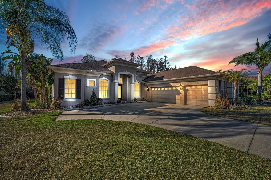 This incredible custom pool home could be yours. Located in the desirable Oakstead subdivision, Land O Lakes. The home consists of 4 bedrooms, 3 bathrooms, and a three-car garage. The floor plan is a triple-split home. It is situated on a large conservation lot; you’ll love the privacy and nature of the back yard.  Step through the beautiful double front door into the pleasing foyer. To the left there is a lovely double glass door to the office/den, to the right is the formal dining room. The large living room features crown molding, volume ceilings, custom lighting, ceramic tile and large sliding glass doors that open to the pool. The oversize lanai is perfect for entertaining family and friends. The space has covered areas, and the beautiful pool includes a waterfall and with views of the conservation area, very relaxing. The kitchen features granite counter tops, custom light fixtures, custom wood cabinetry, Cooling wine rack, microwave, gas stove, built in oven and refrigerator. The spacious primary bedroom has a relaxing view of the pool and waterfall area, two walk-in closets and the bath offers a garden tub and a walk-in shower. Other features of the home include a central vacuum system, a whole house air purifier, built-in speakers, plantation shutters, tray ceilings natural gas heating, and interior laundry with cabinets and sink. It is conveniently located to shopping, restaurants, schools, the Suncoast Expressway and Interstate 75. The Oakstead community offers amenities that include playground, fitness center, tennis courts, community center with pool and beautiful nature trails. 
Your dream home is waiting ? schedule a private tour today!