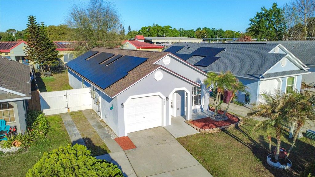 Photo of 9660 Hollyhill Drive, Orlando, FL 32824 (MLS # O6392763)