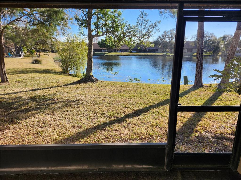 Photo of 9896 Lake Seminole Drive E, Largo, FL 33773 (MLS # TB8478435)