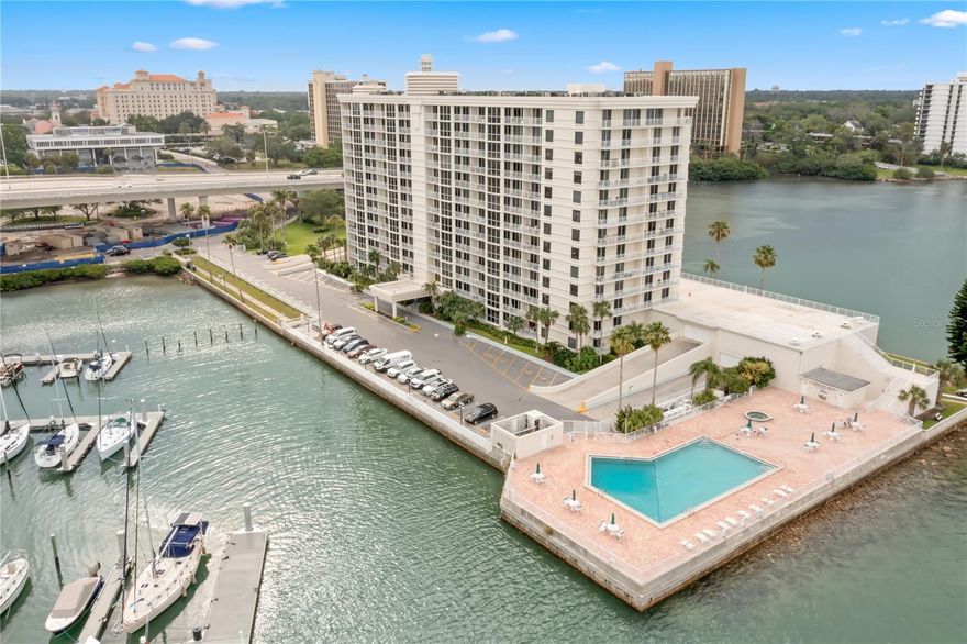 Experience breathtaking panoramic views of Clearwater Beach and the Intracoastal Waterway from this 10th-floor, 2-bedroom, 2-bath corner-unit condo in the highly sought-after 100 Pierce community. Enter through the elegant lobby and take the elevator to your private oasis. As you step inside, you’ll be immediately captivated by the stunning water views that fill the space with natural light. The open-concept great room offers plenty of space for living and dining, with floor-to-ceiling sliders leading to the first of two covered balconies — perfect for entertaining or simply soaking in the view. A raised bonus area offers flexible use as an office, family room, or reading nook. The updated kitchen features granite countertops, stainless steel appliances, and abundant cabinetry, with easy access from both the hallway and living area. Down the hall, you’ll find a large linen closet and a beautifully updated guest bath with a step-in rain shower. The second bedroom offers its own balcony access and sweeping water views. The spacious primary suite includes a large picture window and balcony overlooking the Intracoastal and Clearwater Beach — the perfect spot to enjoy morning coffee or evening sunsets. The en suite bath includes another step-in shower plus an in-unit washer and dryer. Community amenities include assigned parking, a storage closet, and a waterfront pool. Enjoy a prime location next to Coachman Park and within walking distance of downtown Clearwater’s shops, restaurants, and entertainment. Don’t miss your chance to live the true Florida dream — schedule your private showing today!