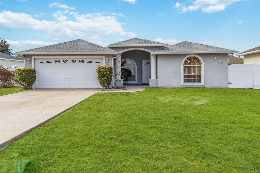 Photo of 1912 Manatee Dr, Poinciana, FL 34759 (MLS # S5143830)