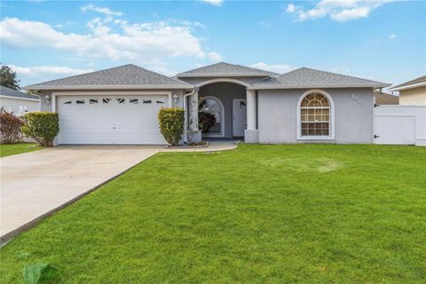 Photo of 1912 Manatee Dr, Poinciana, FL 34759 (MLS # S5143830)