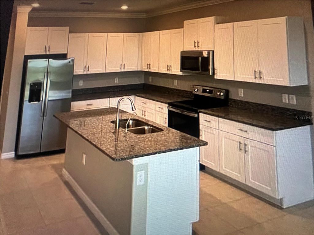 Photo of 31611 Blue Passing Loop, Wesley Chapel, FL 33545 (MLS # TB8419449)