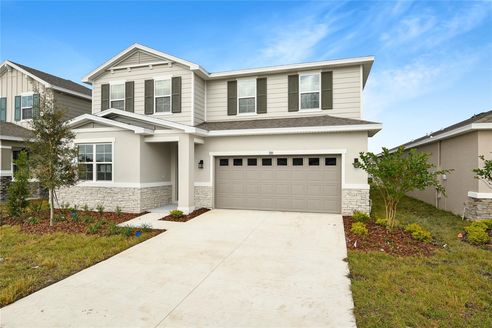 Explore this thoughtfully designed Ammolite home, ready for quick move-in. Included features: an inviting covered entry; a large great room; a well-appointed kitchen offering 42" white cabinets, quartz countertops, stainless-steel appliances, a center island, and a roomy pantry; a roomy nook; an impressive guest suite boasting a living room, a bedroom and a bathroom; a beautiful primary suite showcasing an expansive walk-in closet and a private bath with double sinks; a convenient laundry with a washer and dryer; a covered patio and a 2-car garage. This home also offers ceramic tile flooring in select rooms. Tour today! 1x capital contribution fee of $850.