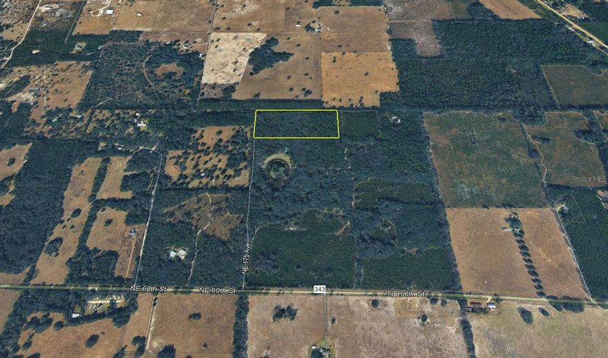 20 ACRES OF PRIME NORTH FLORIDA LAND — NO DEED RESTRICTIONS. Discover the freedom of wide open space on this versatile 20 acre property located off NE 60th Avenue, just minutes from downtown Williston and with easy access to US Highway 27. Offering a peaceful rural setting without sacrificing convenience, this property is well suited for a farmstead, recreational retreat, or long term land investment.

Electric service is already run to the property, and an established network of trails winds throughout the acreage, making it easy to explore, maintain, and enjoy from day one. The sale also includes a John Deere tractor with implements, adding immediate value and functionality for land maintenance, farming, or future improvements.

Zoned Agricultural with no deed restrictions, the land offers exceptional flexibility for a variety of uses. Enjoy a central North Florida location—approximately 7 minutes to downtown Williston, 13 minutes to Archer, and 30 minutes to Gainesville—providing access to shopping, dining, schools, and medical services while preserving privacy and space.

Properties of this size, condition, and location are increasingly hard to find. This is an opportunity to own usable acreage with infrastructure already in place.
