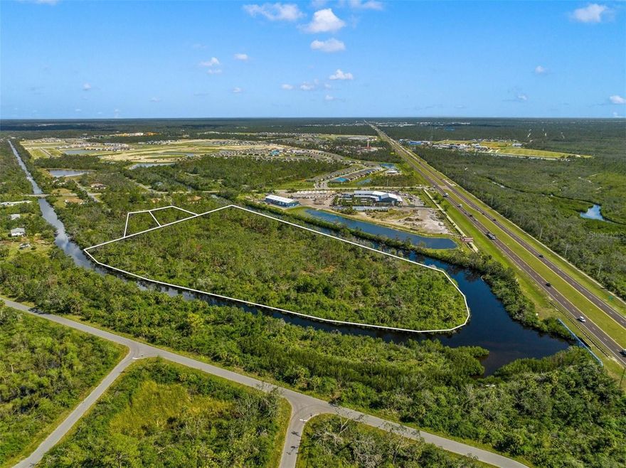 This 15+ acre commercial general vacant land offers an exceptional development opportunity, located near major developments like West Port, MRT ACE Garden Center, Harley Davidson's Twisted Fork Entertainment, the Tampa Bay Rays Stadium, County Fairgrounds, and the Riverwood Community and Golf. Easily accessible via Exit 179 off I-75, this high and dry property is bordered by a canal, ensuring privacy and providing unique design possibilities. The site is surrounded by quiet, well-designed neighborhoods and offers a variety of potential uses, making it a highly desirable and reasonably priced investment.