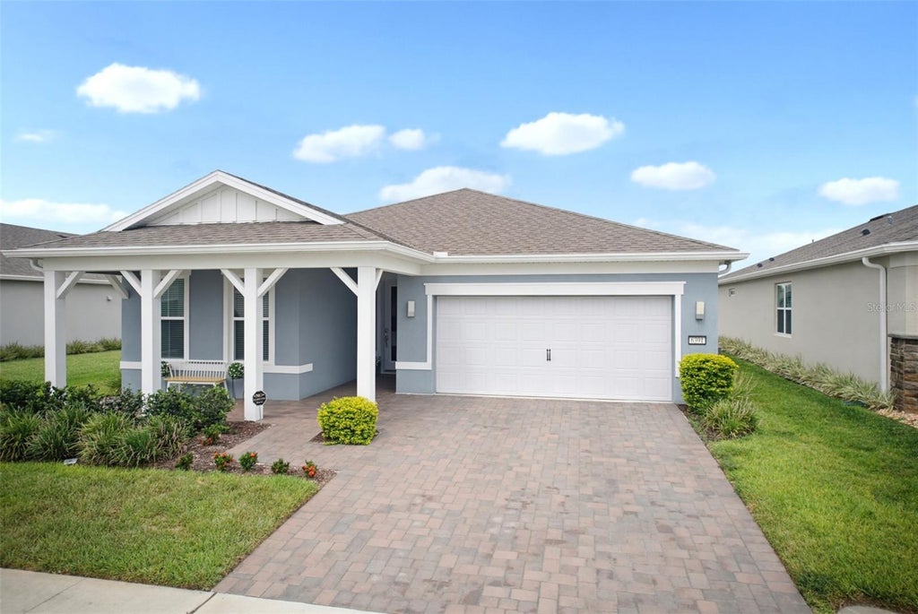 Photo of 6391 Shimmering Shores Lane, Saint Cloud, FL 34771 (MLS # GC542816)
