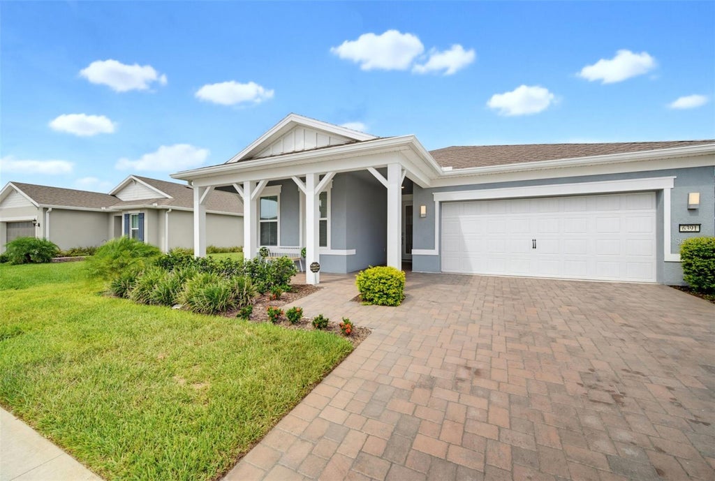 Photo of 6391 Shimmering Shores Lane, Saint Cloud, FL 34771 (MLS # GC542816)